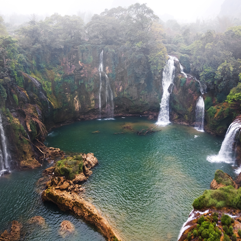 Aerial view on the Ban Gioc Waterfall at cloudy March - the most magnificent waterfall in Vietnam